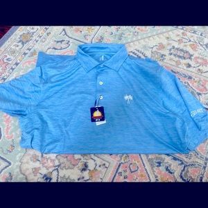 johnnie-o polo shirt in a Carolina blue. Sea Pines logo on sleeve